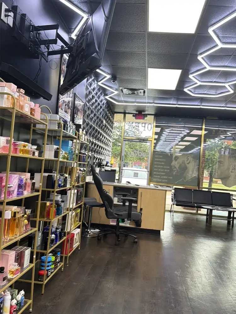 Product shelves and the front desk under hexagon lights