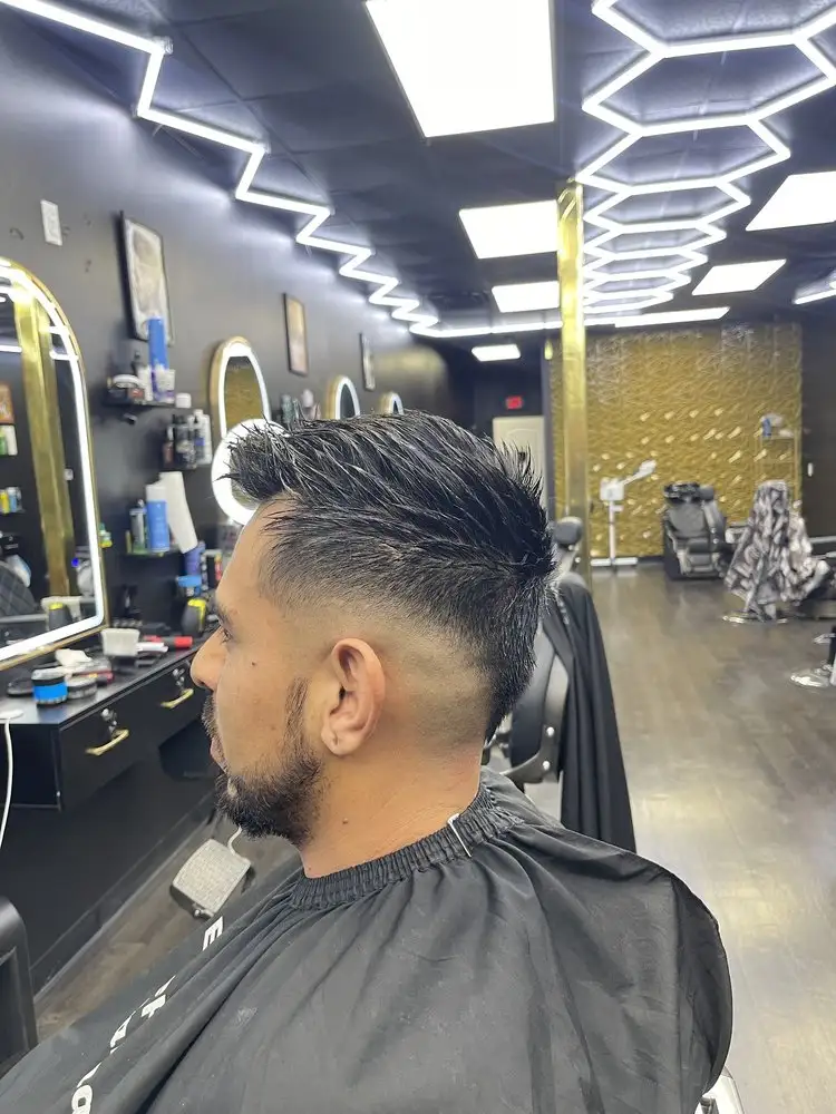 A textured top with a skin fade, side view